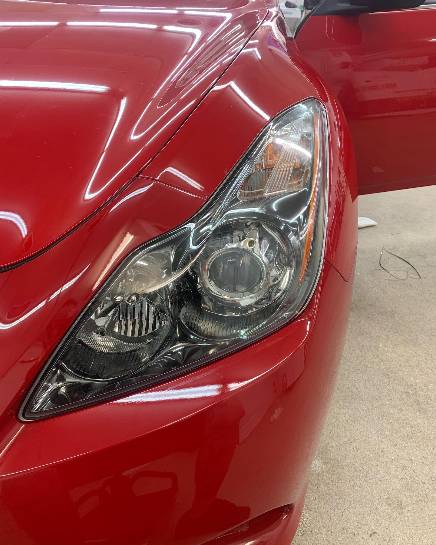 Professionally restored clear headlight on a vehicle